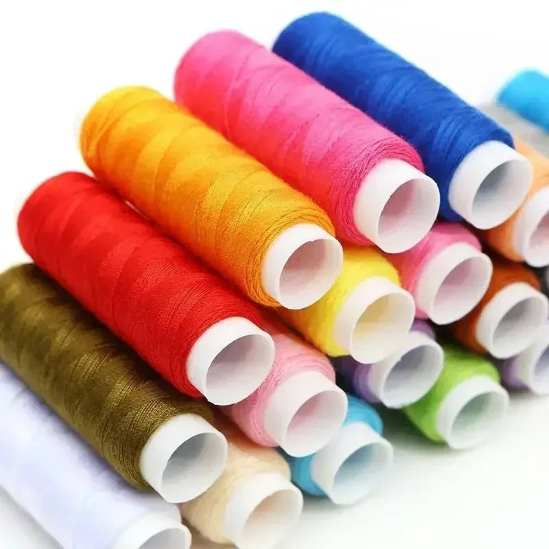 A Compact Travel Sewing Kit That Includes Needles, Threads, Scissors, and Other Emergency Repair Items, Featuring A Mix of Basic